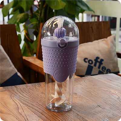 Purple 500ml kids water bottle on table